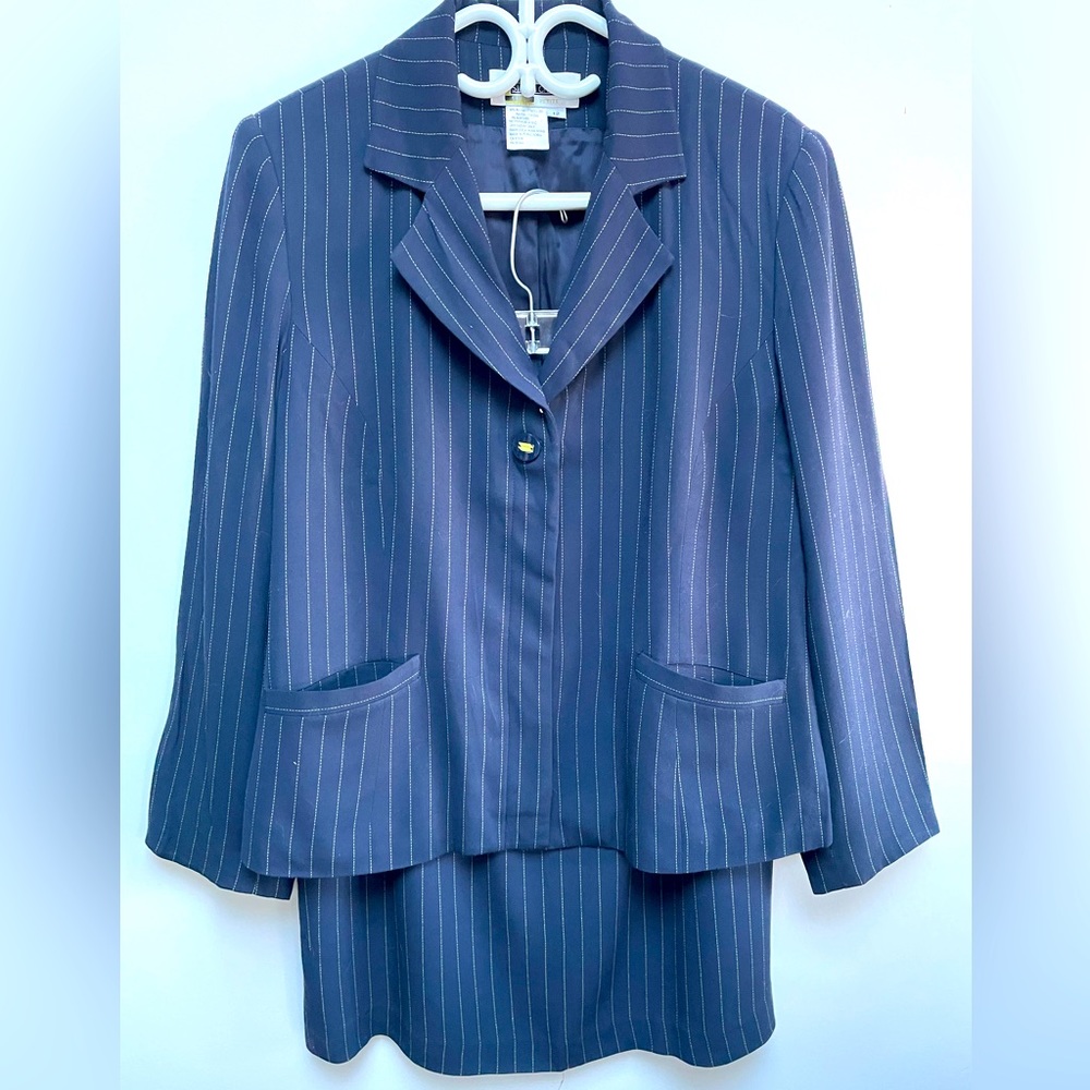 Retro stripe Simon Chang skirt suit. Navy and lime green. Unique button feature.